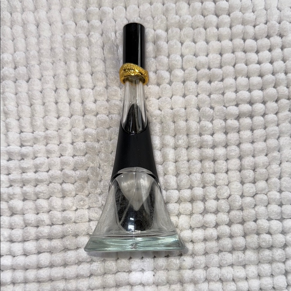 Empty Rihanna Elegant Black and Gold Perfume Bottle